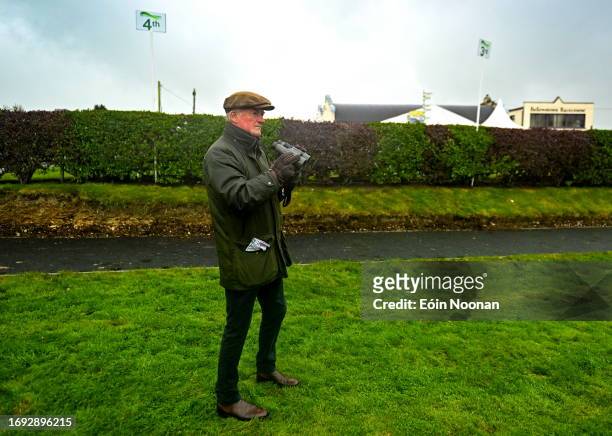 Meath , Ireland - 27 September 2023; Captains Willie Mullins watches the race from the parade ring during the Barney Curley Cup at Bellewstown...