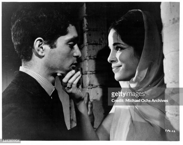 Clifford David shares a tender moment with Louise Sorel in a scene from the film 'The Party's Over', 1965. (Photo by Allied Artists/Getty Images