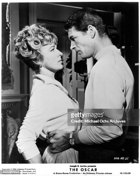 Eleanor Parker is embraced by Stephen Boyd in a scene from the film 'The Oscar', 1966.