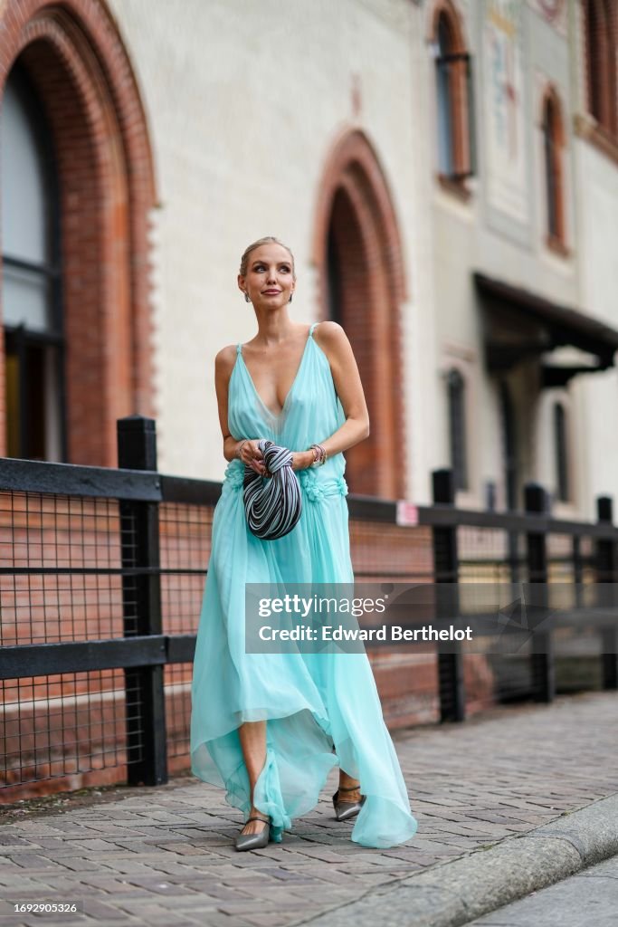 Street Style - Day 2 - Milan Fashion Week - Womenswear Spring/Summer 2024