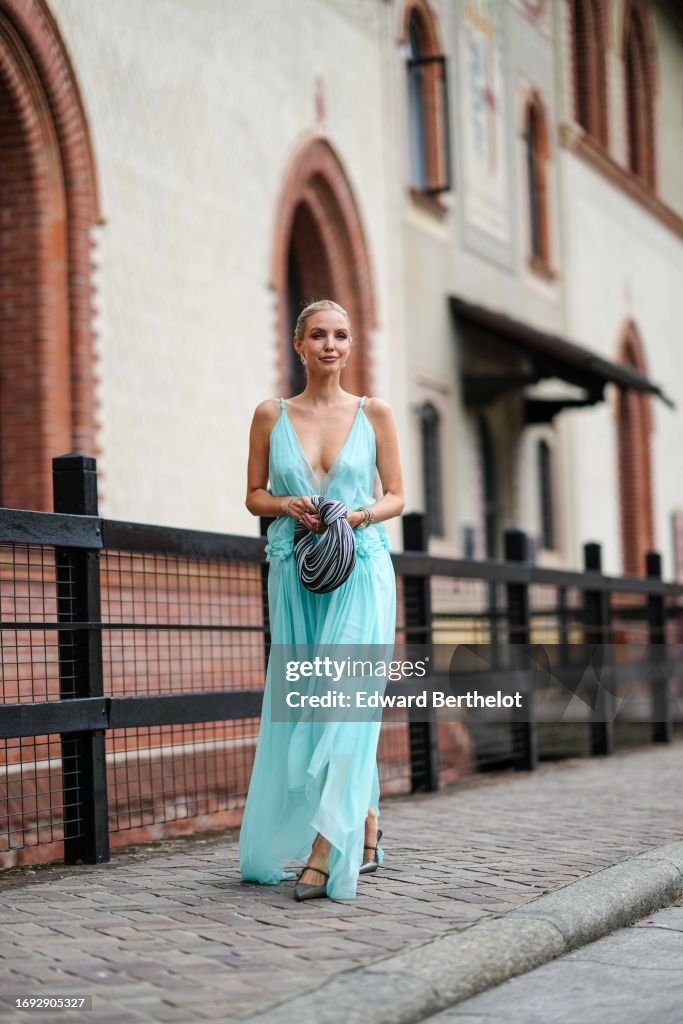 Street Style - Day 2 - Milan Fashion Week - Womenswear Spring/Summer 2024