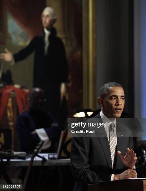 President Barack Obama delivers remarks at a concert honoring singer-songwriter Carole King with the 2013 Library of Congress Gershwin Prize for...