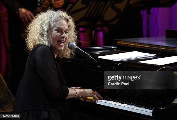 Singer-songwriter Carole King performs after being awarded by U.S. President Barack Obama the 2013 Library of Congress Gershwin Prize for Popular...