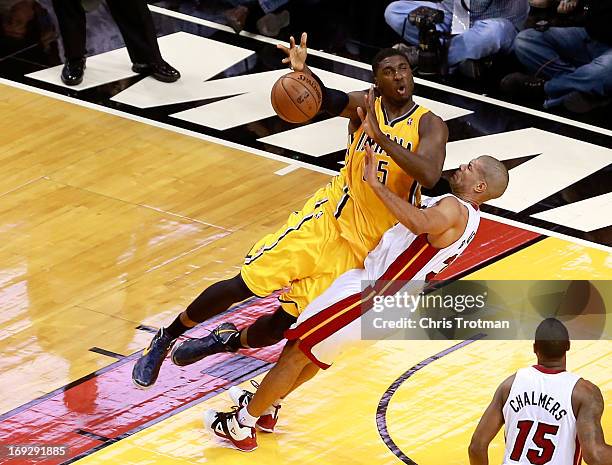 Roy Hibbert of the Indiana Pacers drives to the basket against Shane Battier of the Miami Heat in the first half during Game One of the Eastern...