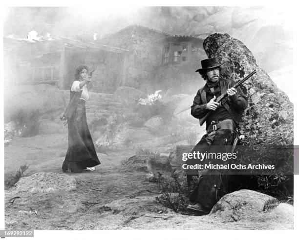 Rosanna Schiaffino and Stephen Boyd fight their way out in a scene from the film 'The Man Called Noon', 1973.