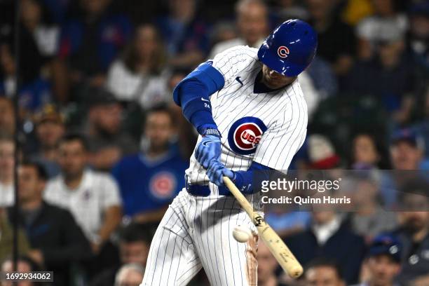 Cody Bellinger of the Chicago Cubs hits a double in the second inning off Mitch Keller of the Pittsburgh Pirates at Wrigley Field on September 20,...