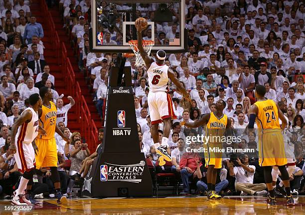 LeBron James of the Miami Heat goes up for a dunk in the third quarter against the Indiana Pacers during Game One of the Eastern Conference Finals at...