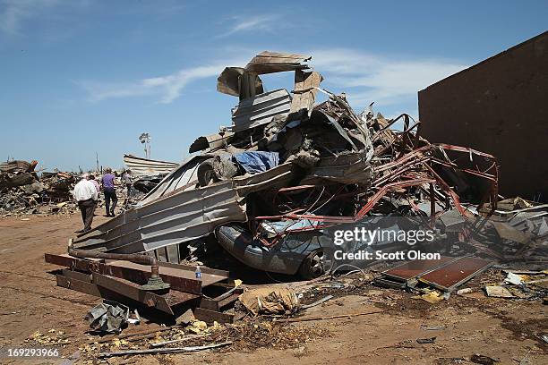 Debris covers the grounds of the Plaza Towers Elementary School where several children died when a tornado that ripped through the area on May 22,...