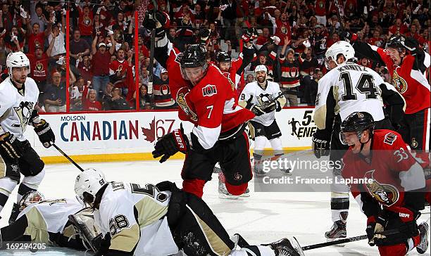 Kyle Turris of the Ottawa Senators celebrates his first period goal as Jakob Silfverberg, Erik Karlsson, Mark Stone reacts against Tomas Vokoun, Matt...