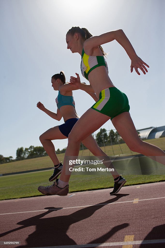 Women running on track