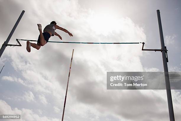 pole vaulter - pole vault stock pictures, royalty-free photos & images