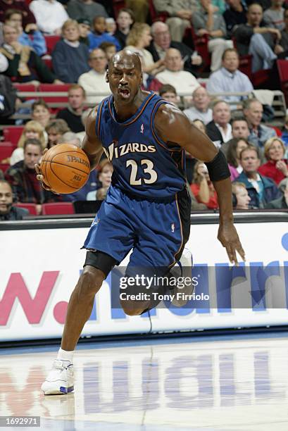 Michael Jordan of the Washington Wizards drives to the basket during the NBA game against the Orlando Magic at TD Waterhouse Centre on December 6,...