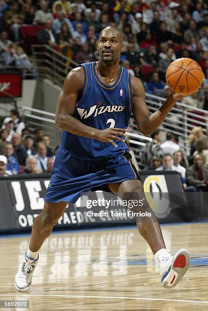 Bryon Russell of the Washington Wizards drives the ball during the NBA game against the Orlando Magic at TD Waterhouse Centre on December 6, 2002 in...