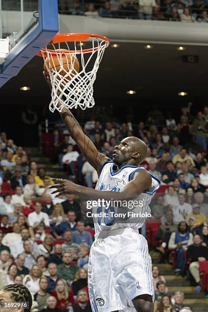 Darrell Armstrong of the Orlando Magic goes up for the layup during the NBA game against the Washington Wizards at TD Waterhouse Centre on December...