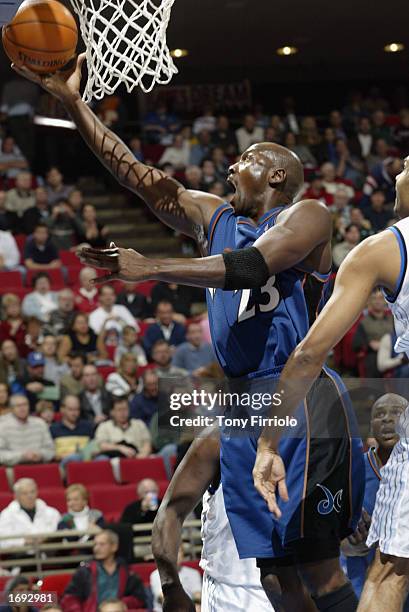 Michael Jordan of the Washington Wizards goes up for the layup during the NBA game against the Orlando Magic at TD Waterhouse Centre on December 6,...