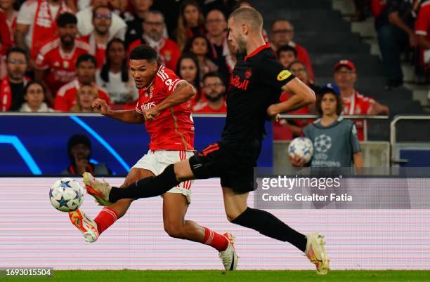 Alexander Bah of SL Benfica with Strahinja Pavlovic of FC Salzburg in action during the Group D - UEFA Champions League 2023/24 match between SL...