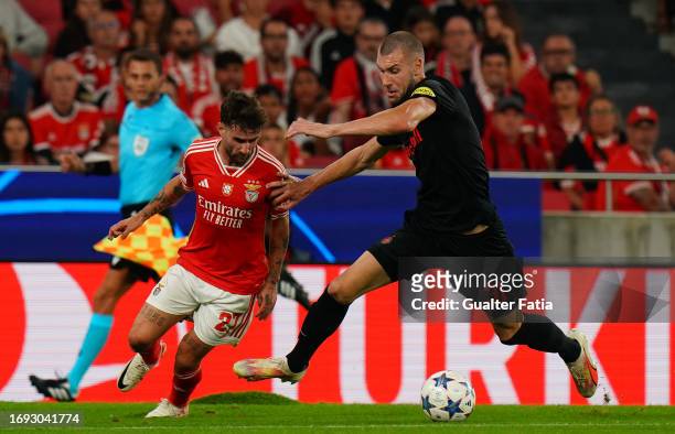 Strahinja Pavlovic of FC Salzburg with Rafa Silva of SL Benfica in action during the Group D - UEFA Champions League 2023/24 match between SL Benfica...