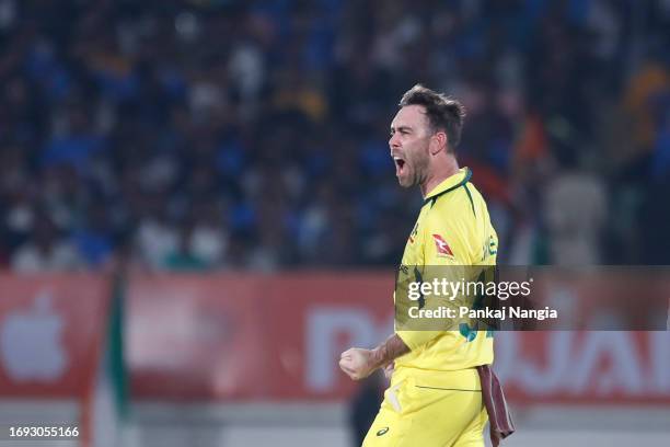 Glenn Maxwell of Australia celebrates the wicket of Shreyas Iyer of India during game three of the One Day International series between India and...