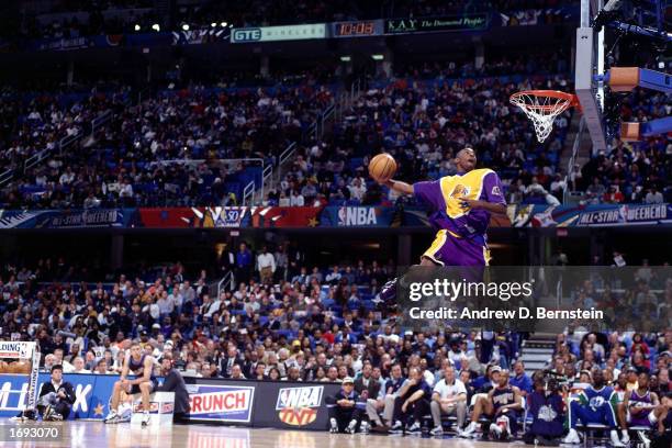 Kobe Bryant of the Los Angeles Lakers goes up for one of his slam dunks that won first place in the NBA All-Star Slam Dunk Contest at Gund Arena on...