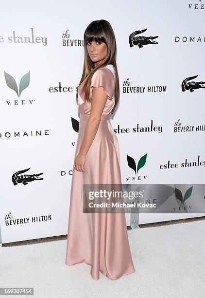 Actress Lea Michele attends The Beverly Hilton unveiling of the redesigned Aqua Star Pool By Estee Stanley at The Beverly Hilton Hotel on May 22,...