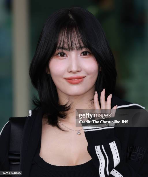 Momo of K-pop girl group TWICE is seen leaving Incheon International Airport for 2023 Milano Fashion Week on September 18, 2023 in Incheon, South...