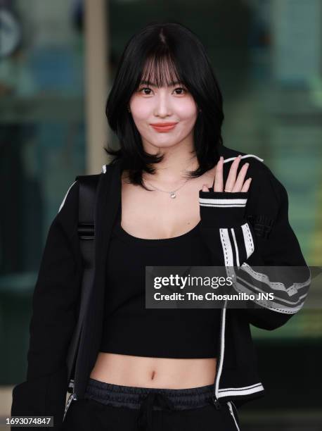 Momo of K-pop girl group TWICE is seen leaving Incheon International Airport for 2023 Milano Fashion Week on September 18, 2023 in Incheon, South...