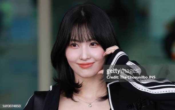Momo of K-pop girl group TWICE is seen leaving Incheon International Airport for 2023 Milano Fashion Week on September 18, 2023 in Incheon, South...