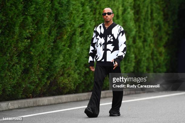 Lewis Hamilton of Great Britain and Mercedes walks in the Paddock during previews ahead of the F1 Grand Prix of Japan at Suzuka International Racing...
