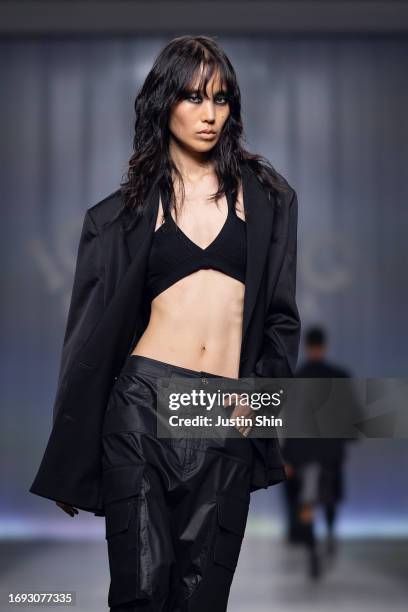 Model walks the runway at the Iceberg fashion show during the Milan Fashion Week Womenswear Spring/Summer 2024 on September 20, 2023 in Milan, Italy.