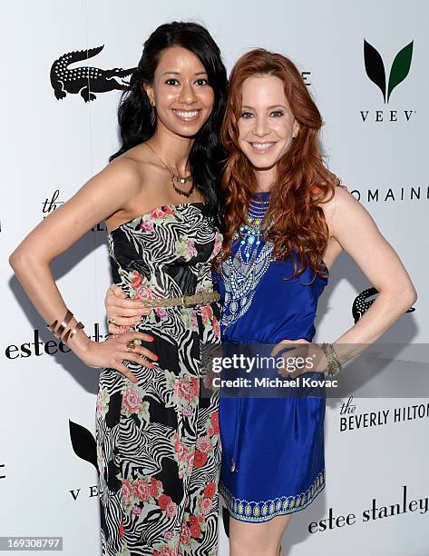 Actresses Sujata Day and Amy Davidson attend The Beverly Hilton unveiling of the redesigned Aqua Star Pool By Estee Stanley at The Beverly Hilton...