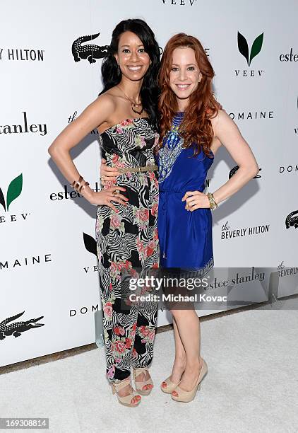 Actresses Sujata Day and Amy Davidson attend The Beverly Hilton unveiling of the redesigned Aqua Star Pool By Estee Stanley at The Beverly Hilton...