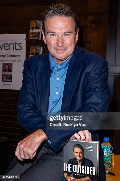 Tennis player Jimmy Connors signs copies of his book "The Outsider" at Barnes & Noble bookstore at The Grove on May 22, 2013 in Los Angeles,...