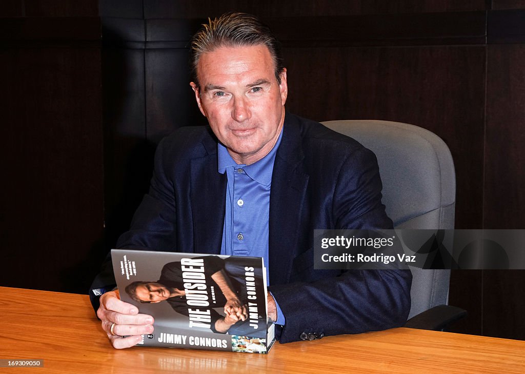 Jimmy Connors Signs Copies Of His Book "The Outsider"