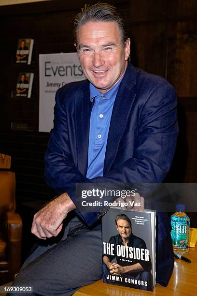 Tennis player Jimmy Connors signs copies of his book "The Outsider" at Barnes & Noble bookstore at The Grove on May 22, 2013 in Los Angeles,...