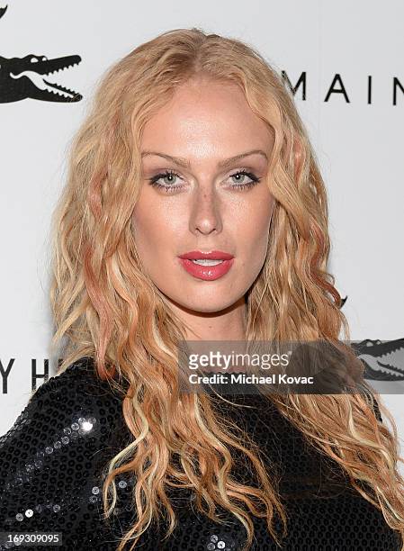 Model CariDee English attends The Beverly Hilton unveiling of the redesigned Aqua Star Pool By Estee Stanley at The Beverly Hilton Hotel on May 22,...