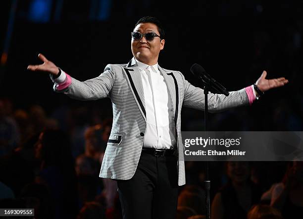 Rapper Psy speaks at the 2013 Billboard Music Awards at the MGM Grand Garden Arena on May 19, 2013 in Las Vegas, Nevada.
