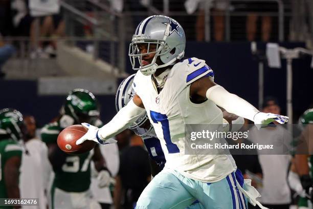 Trevon Diggs of the Dallas Cowboys celebrates an interception against the New York Jets during the fourth quarter at AT&T Stadium on September 17,...