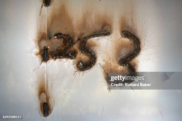 Scorched flat number, welded shut in Wendover House and due for eventual demolition on the Aylesbury Estate in Southwark, on 27th September 2023, in...
