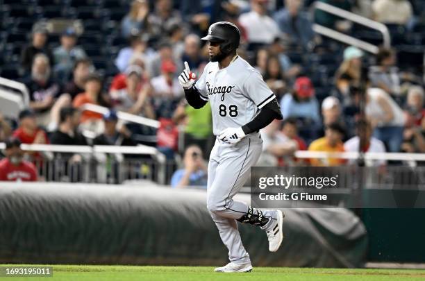 Luis Robert Jr. #88 of the Chicago White Sox rounds the bases after hitting a home run against the Washington Nationals at Nationals Park on...