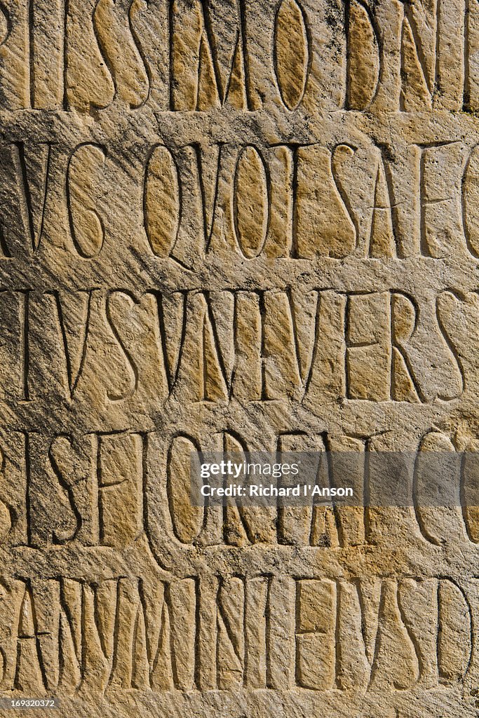 Stone inscription at Dougga Roman monument