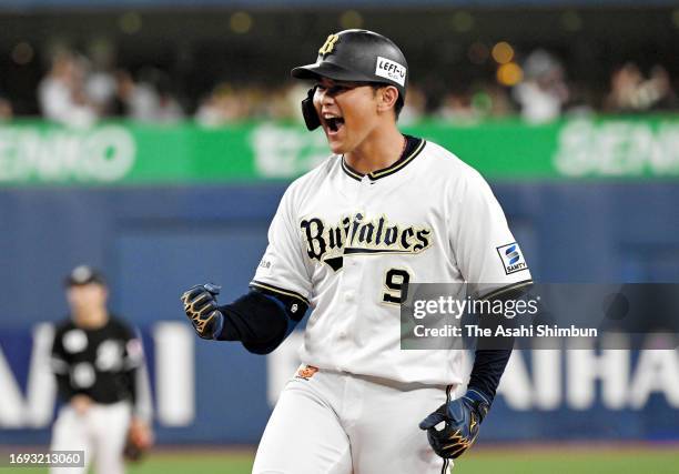 Tomoya Noguchi of the Orix Buffaloes celebrates hitting a RBI single in the 7th inning during the game against Chiba Lotte Marines at Kyocera Dome...