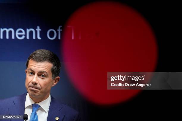 Transportation Secretary Pete Buttigieg speaks during a news conference at the U.S. Department of Transportation headquarters on September 27, 2023...