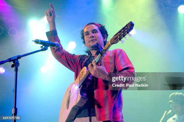 Colombian singer and guitarist Jorge Villamizar, from the Latin pop group Bacilos, performs on stage, Chicago, Illinois, May 20, 2003.