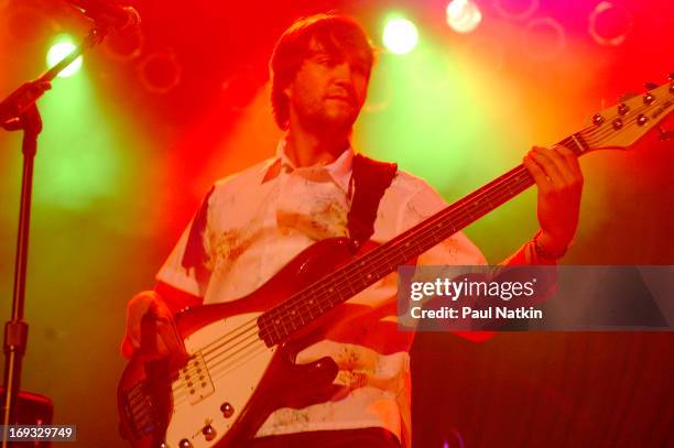 Brazilian bassist Andre Lopes, from the Latin pop group Bacilos, performs on stage, Chicago, Illinois, May 20, 2003.