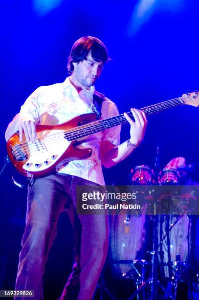 Brazilian bassist Andre Lopes, from the Latin pop group Bacilos, performs on stage, Chicago, Illinois, May 20, 2003.