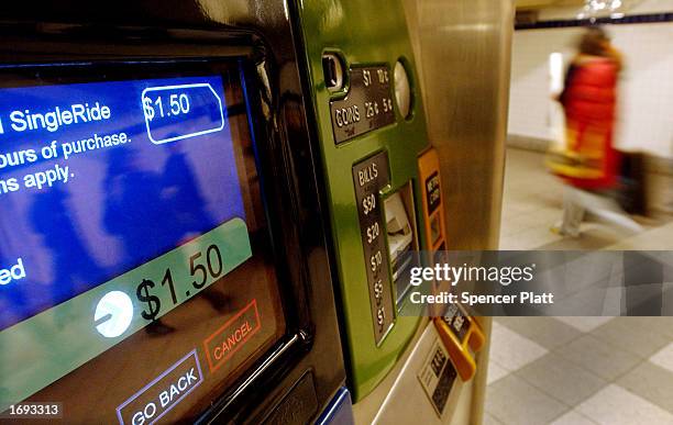 Metrocard machine displays the current price, $1.50, for a ride on the New York City subway or bus lines at a subway station December 18, 2002 in New...