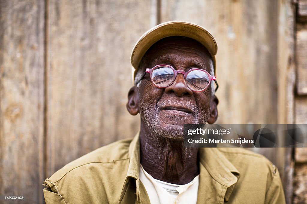 Cuban man with glasses and hat