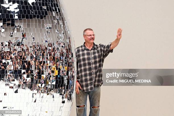 Swedish fashion designer Jonny Johansson acknowledges the audience at the end of the Acne Studios show during the Paris Fashion Week Womenswear...