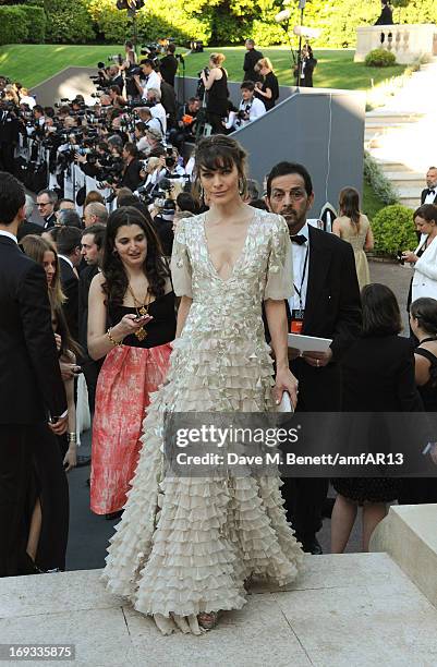 Milla Jovovich attends amfAR's 20th Annual Cinema Against AIDS during The 66th Annual Cannes Film Festival at Hotel du Cap-Eden-Roc on May 23, 2013...