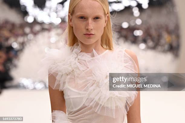 Model walks on the runway of the Acne Studios show during the Paris Fashion Week Womenswear Spring/Summer 2024 in Paris on September 25, 2023.